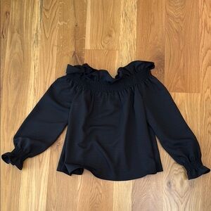 Black Off-Shoulder Women's Top with ruffle detail. Size XS. Worn once.